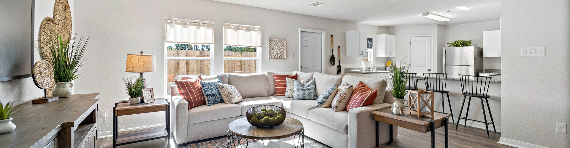 A living room with a couch and coffee table.