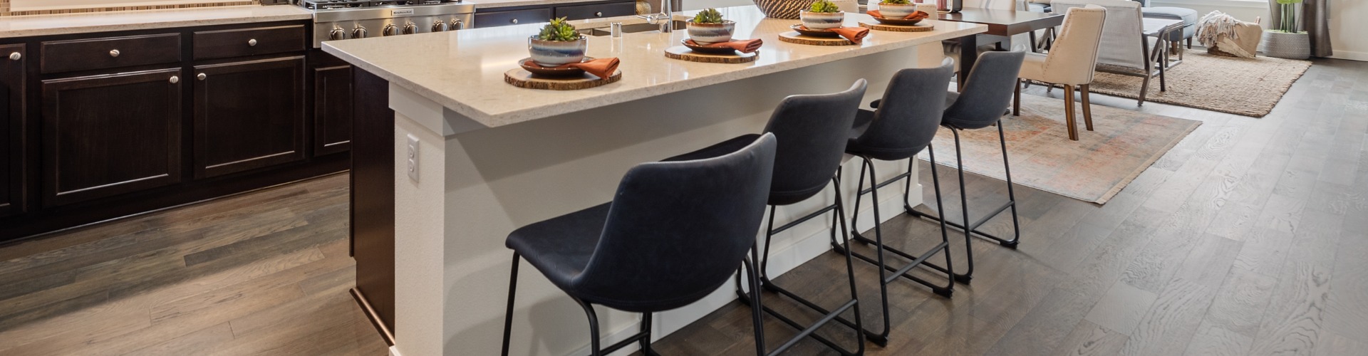 A table with chairs around it.