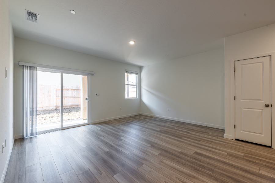 A room with a wood floor and a wood floor.