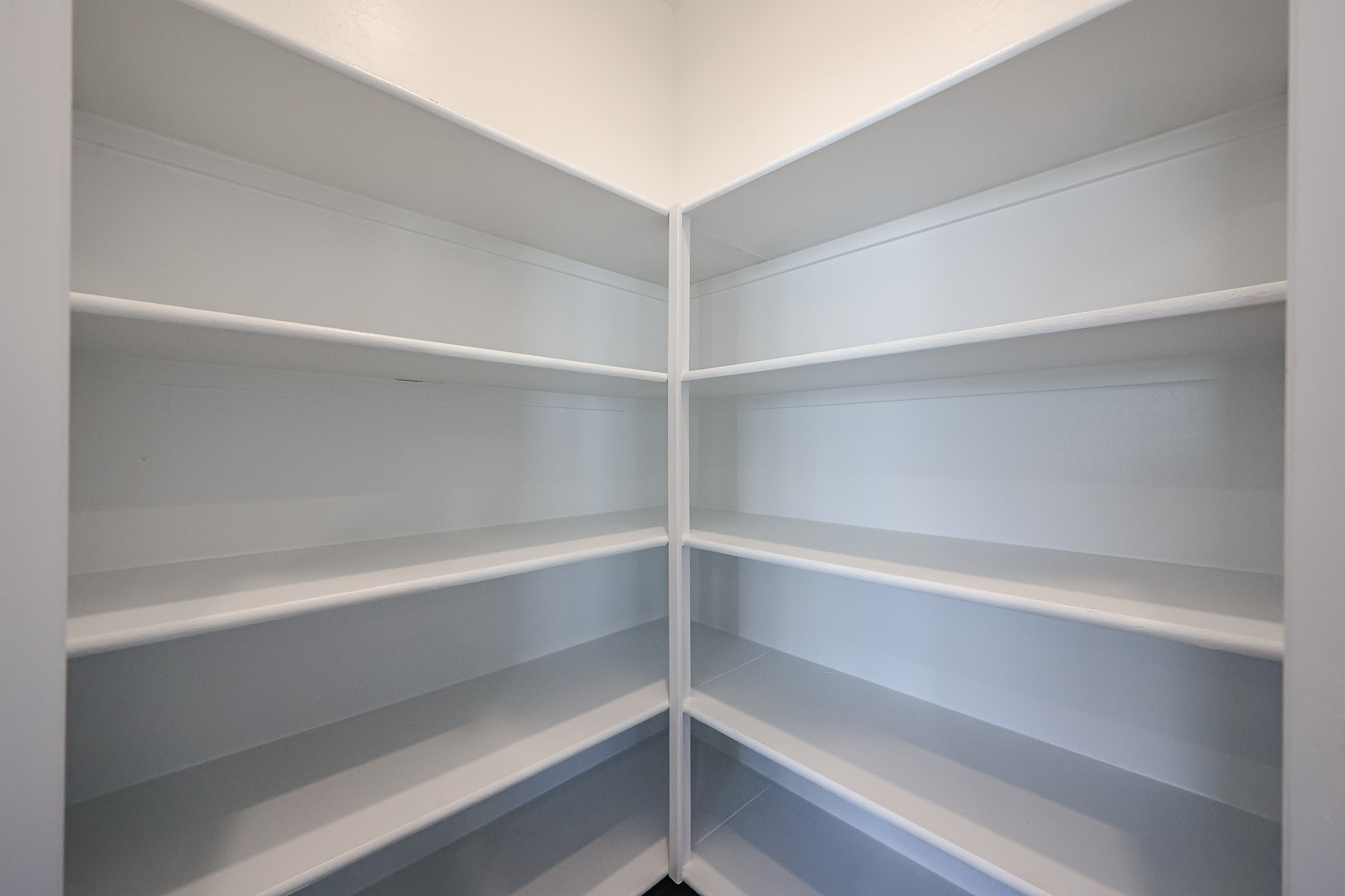 A white shelf with white shelves.