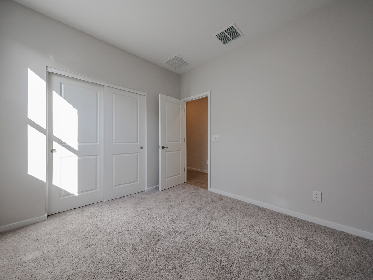 A room with white doors.