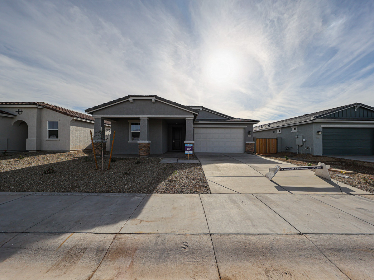 A group of buildings with a road.