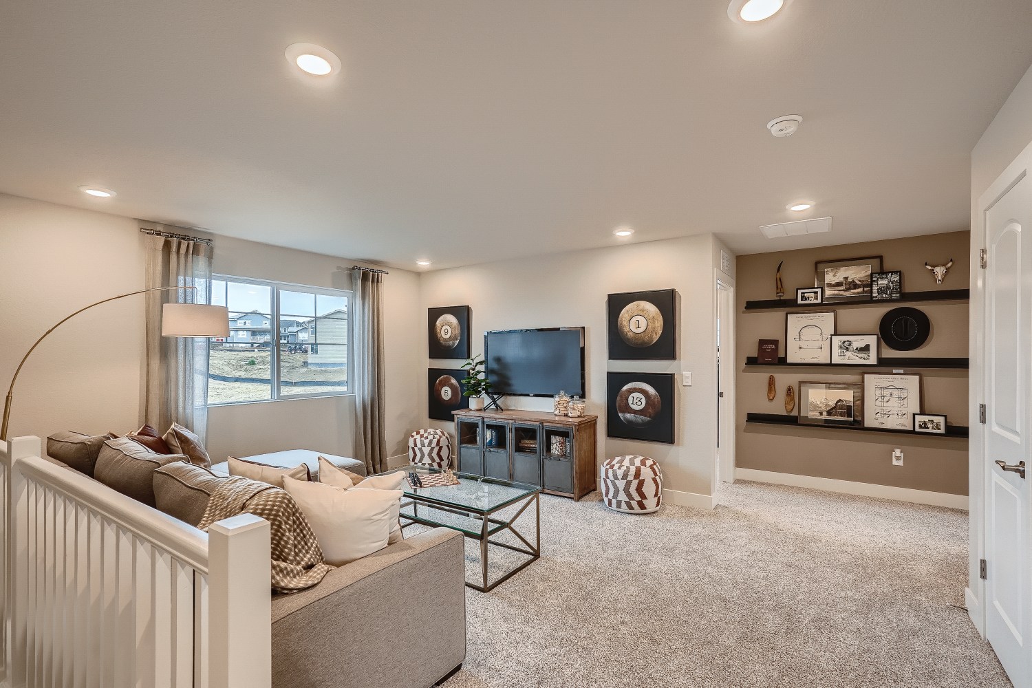 A living room with a tv and couches.