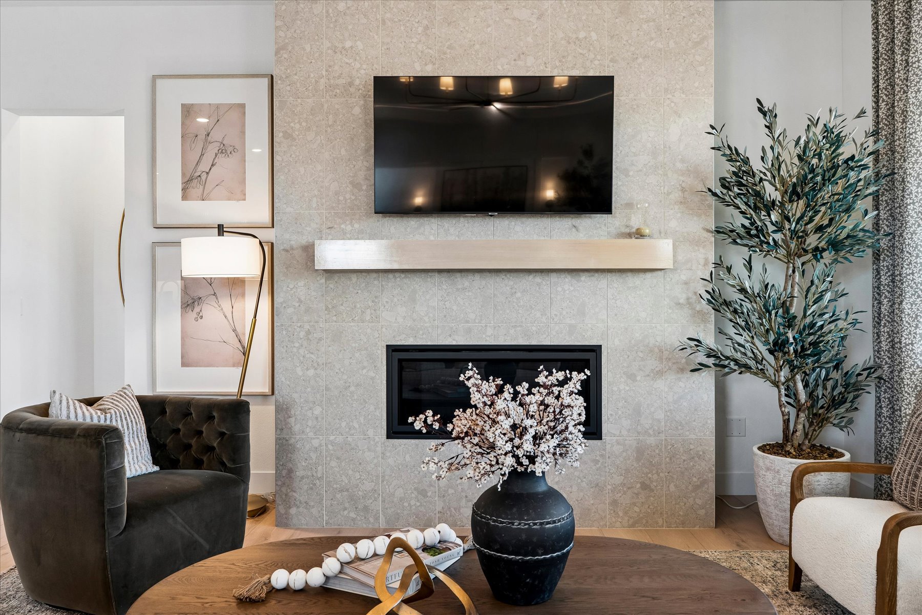 A living room with a fireplace.