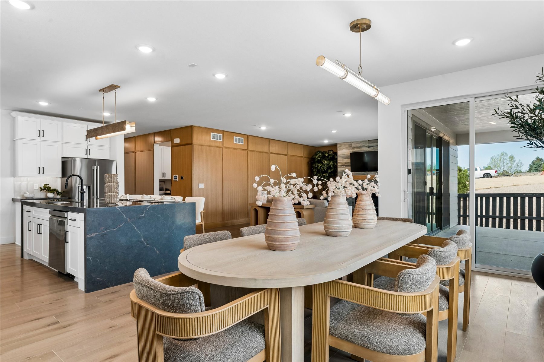 A kitchen with a dining table.