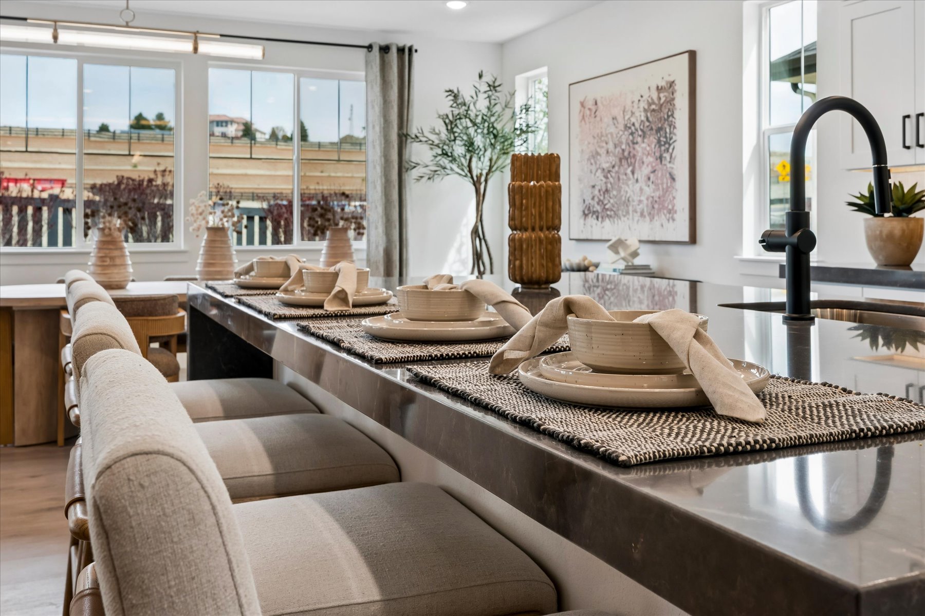 A large kitchen with a large table.