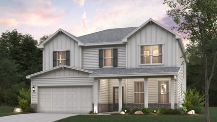 A house with trees in the back.