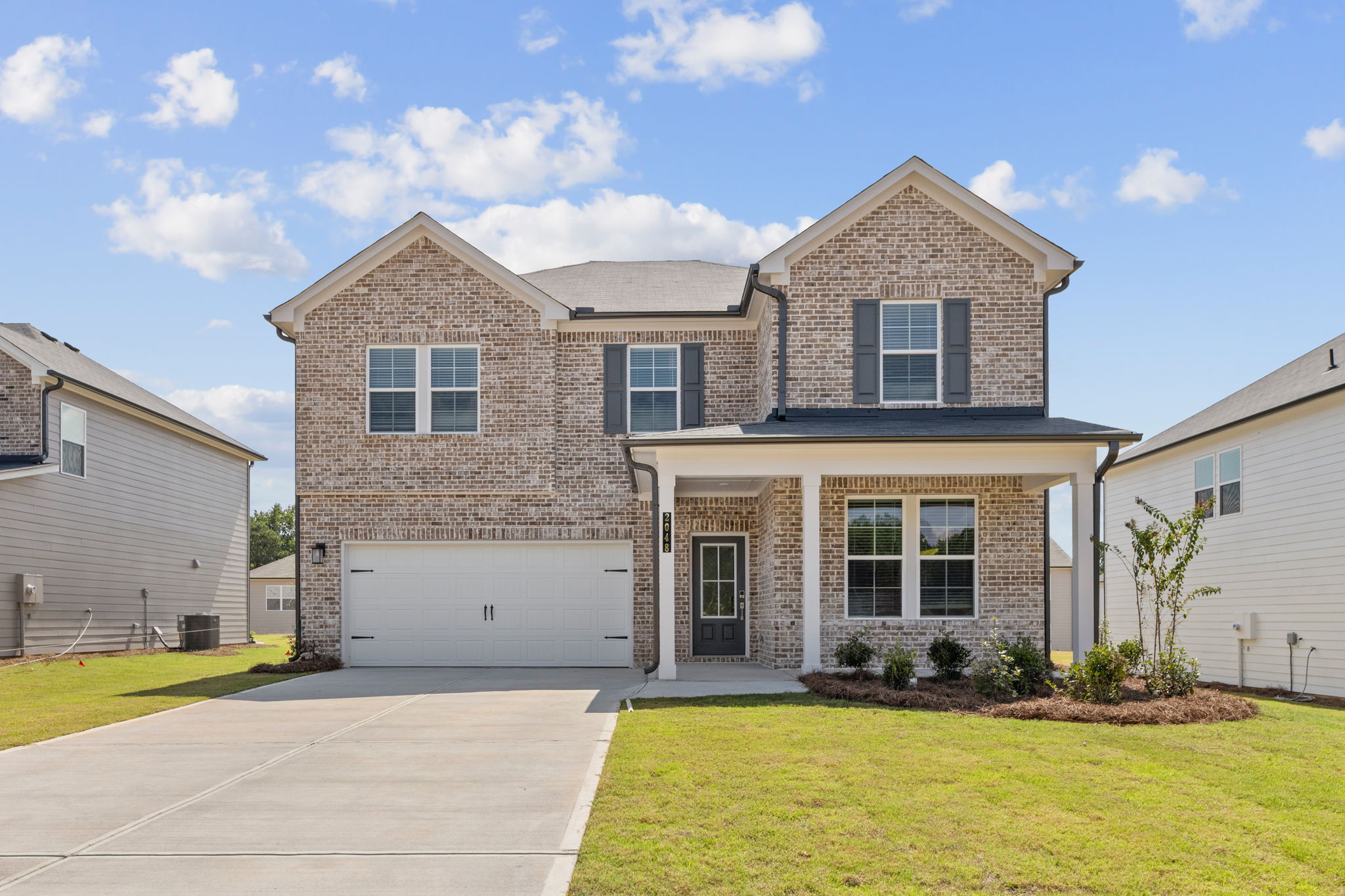 A house with a driveway.