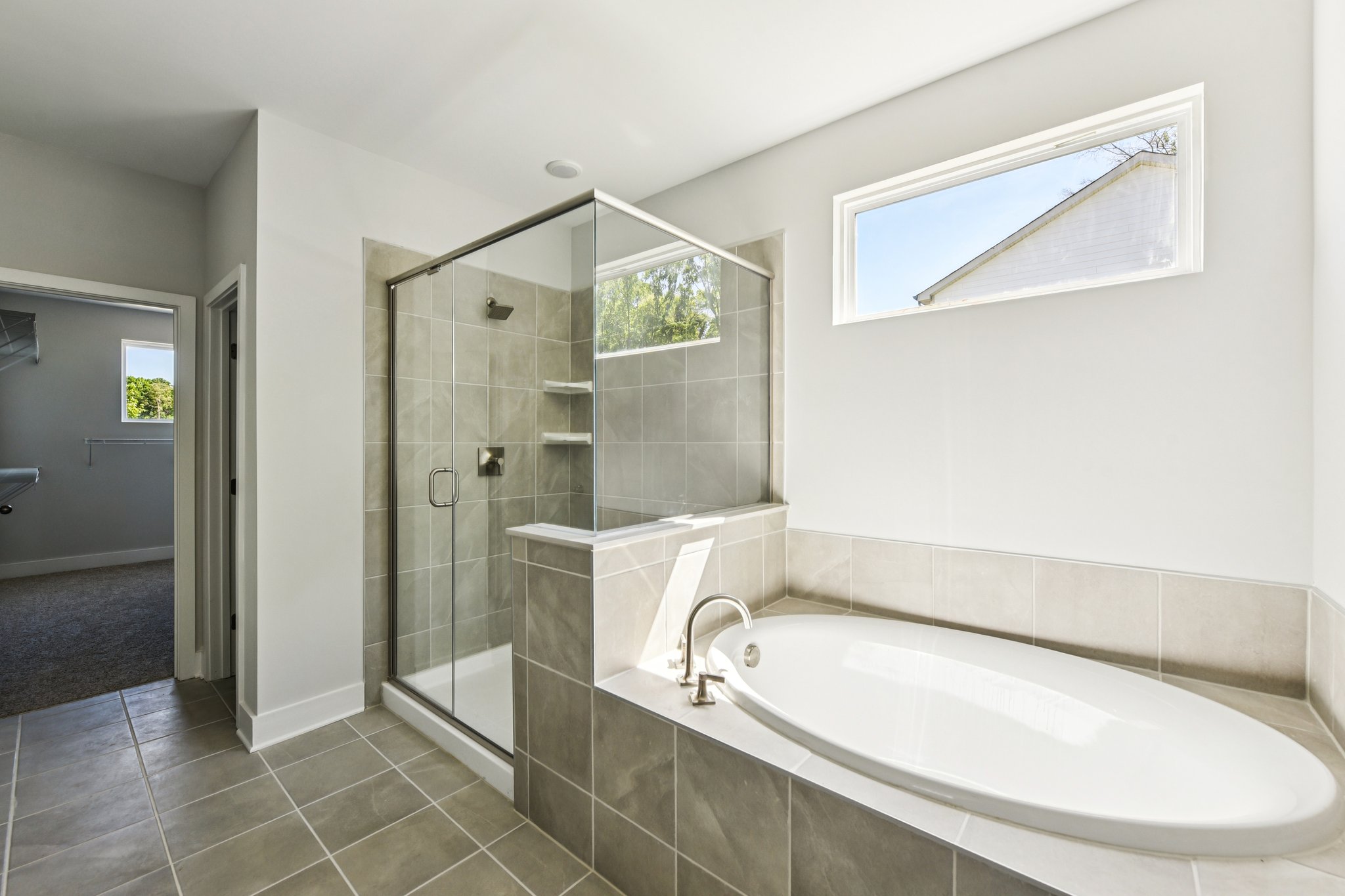 A bathroom with a glass shower.