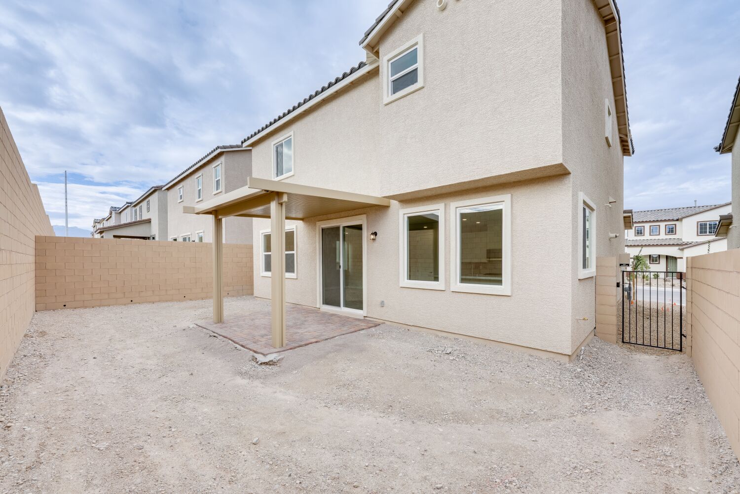 A white house with a fence.