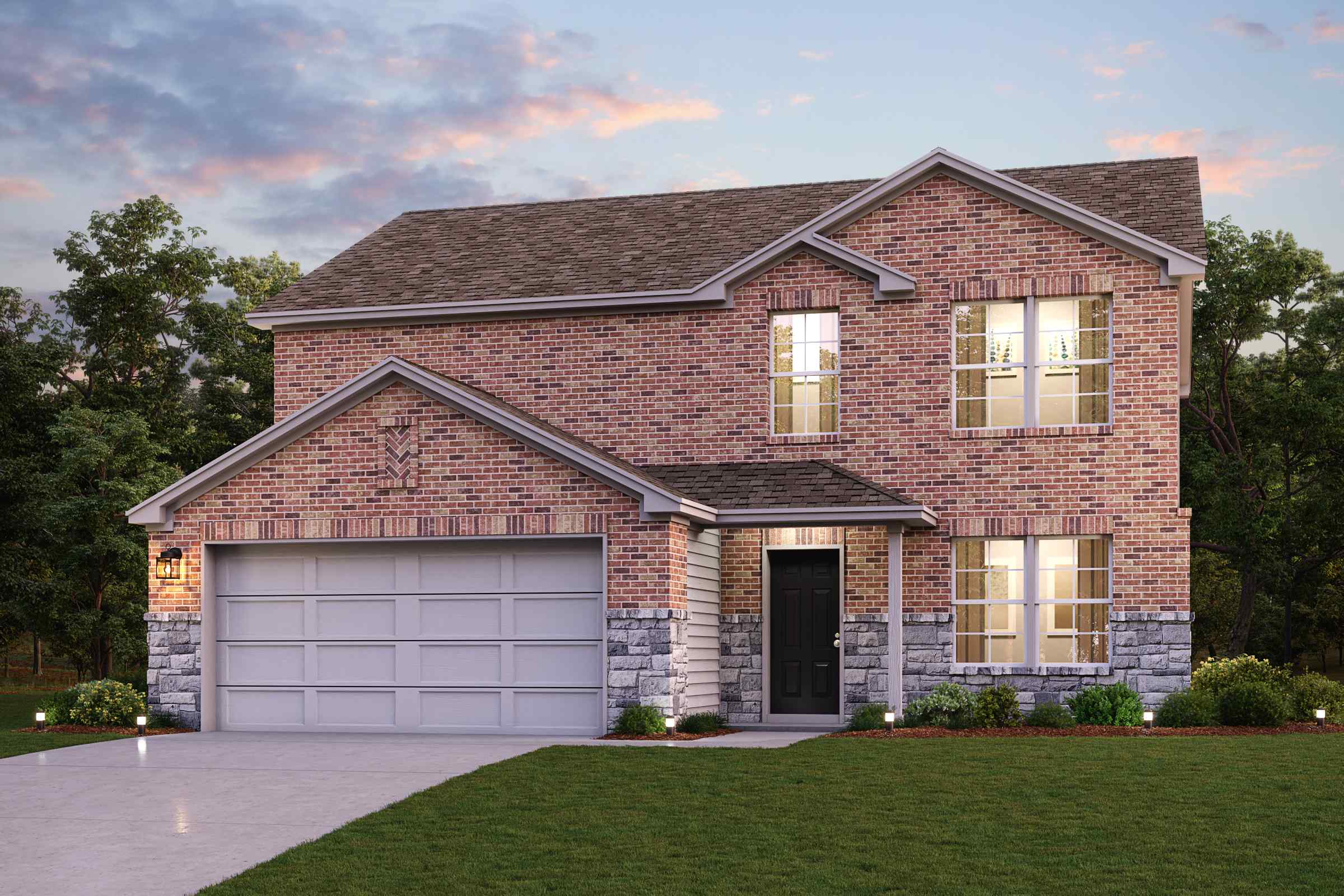 A brick house with a garage.