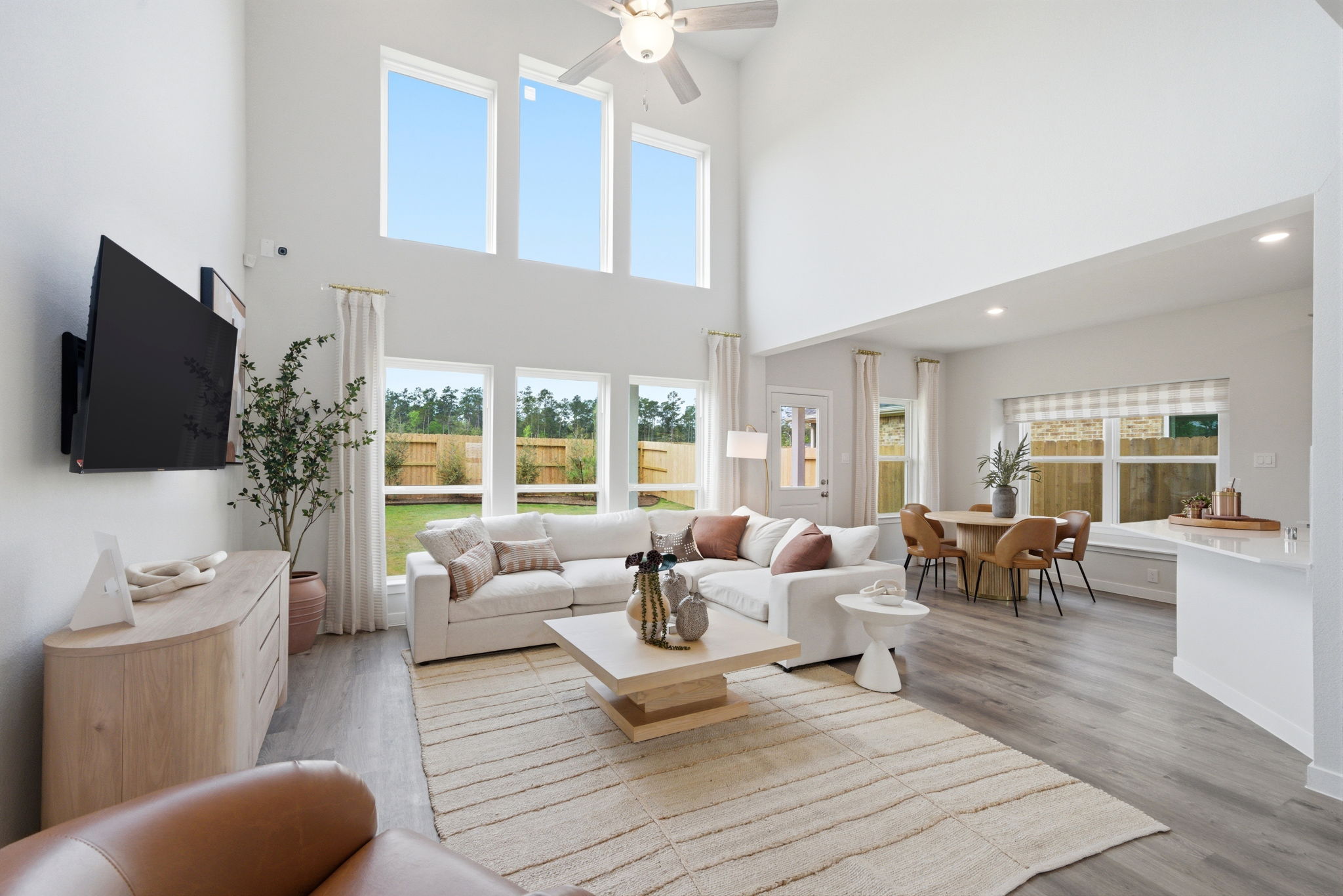 A living room with a large window.