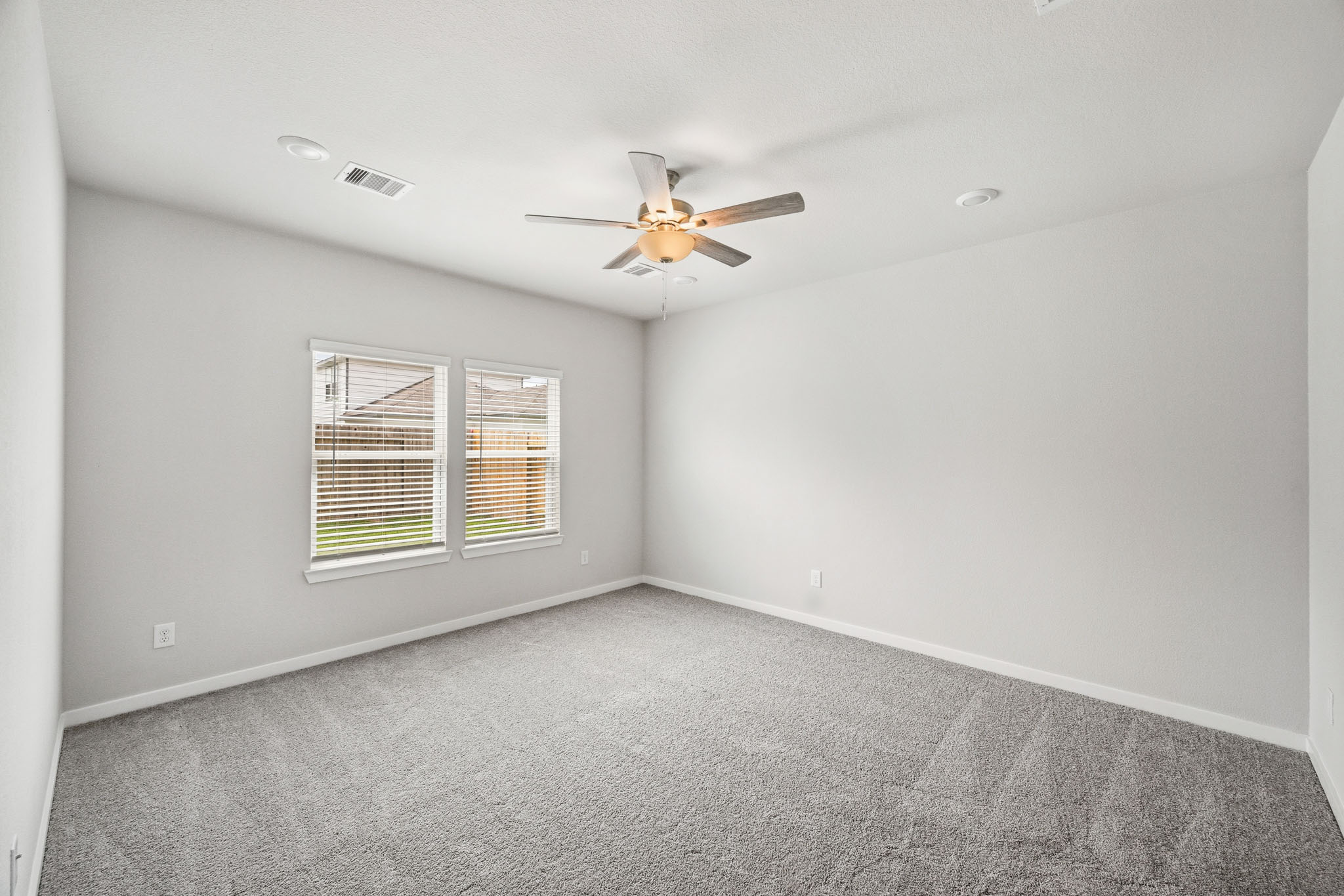 A ceiling fan in a room.
