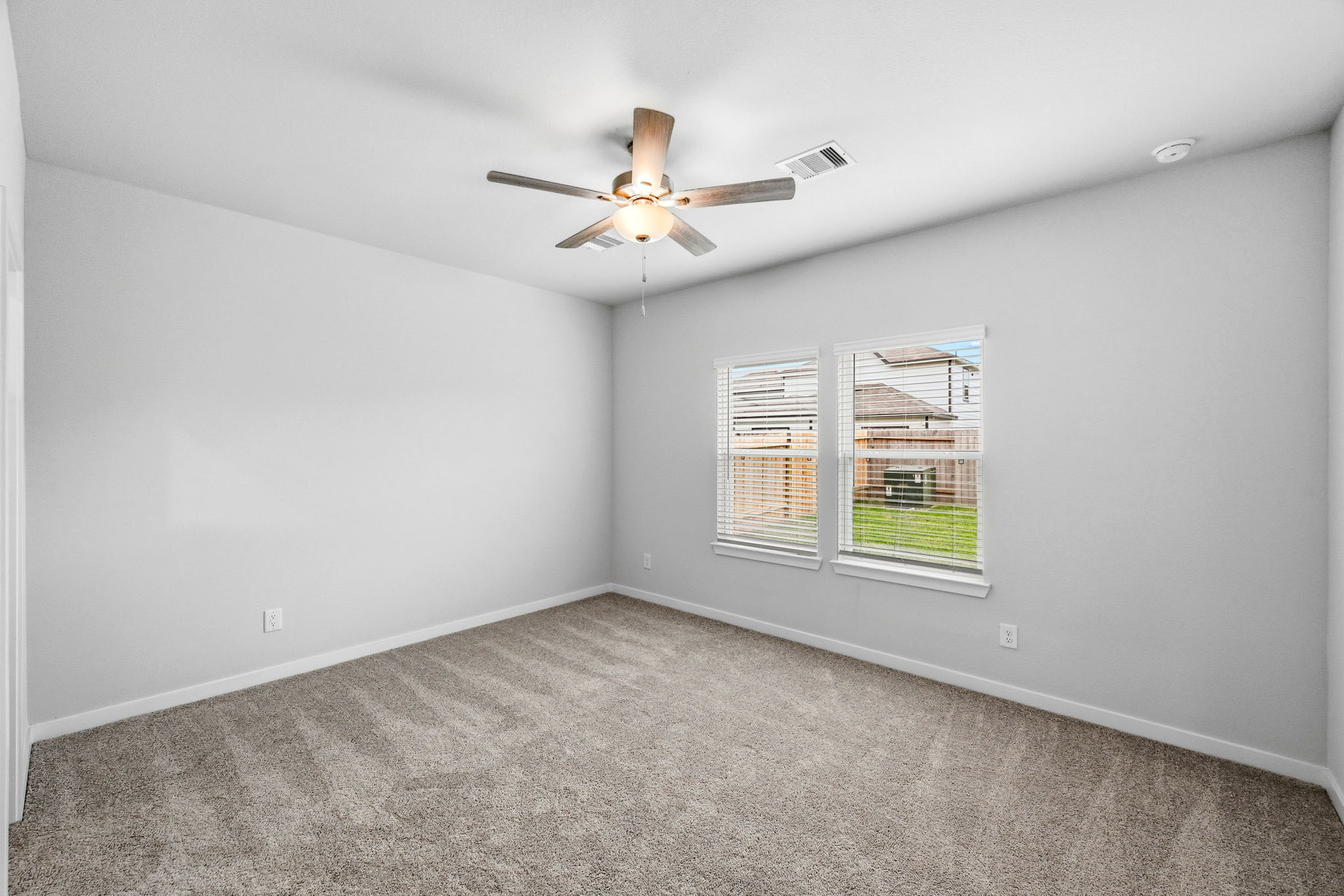 A ceiling fan in a room.
