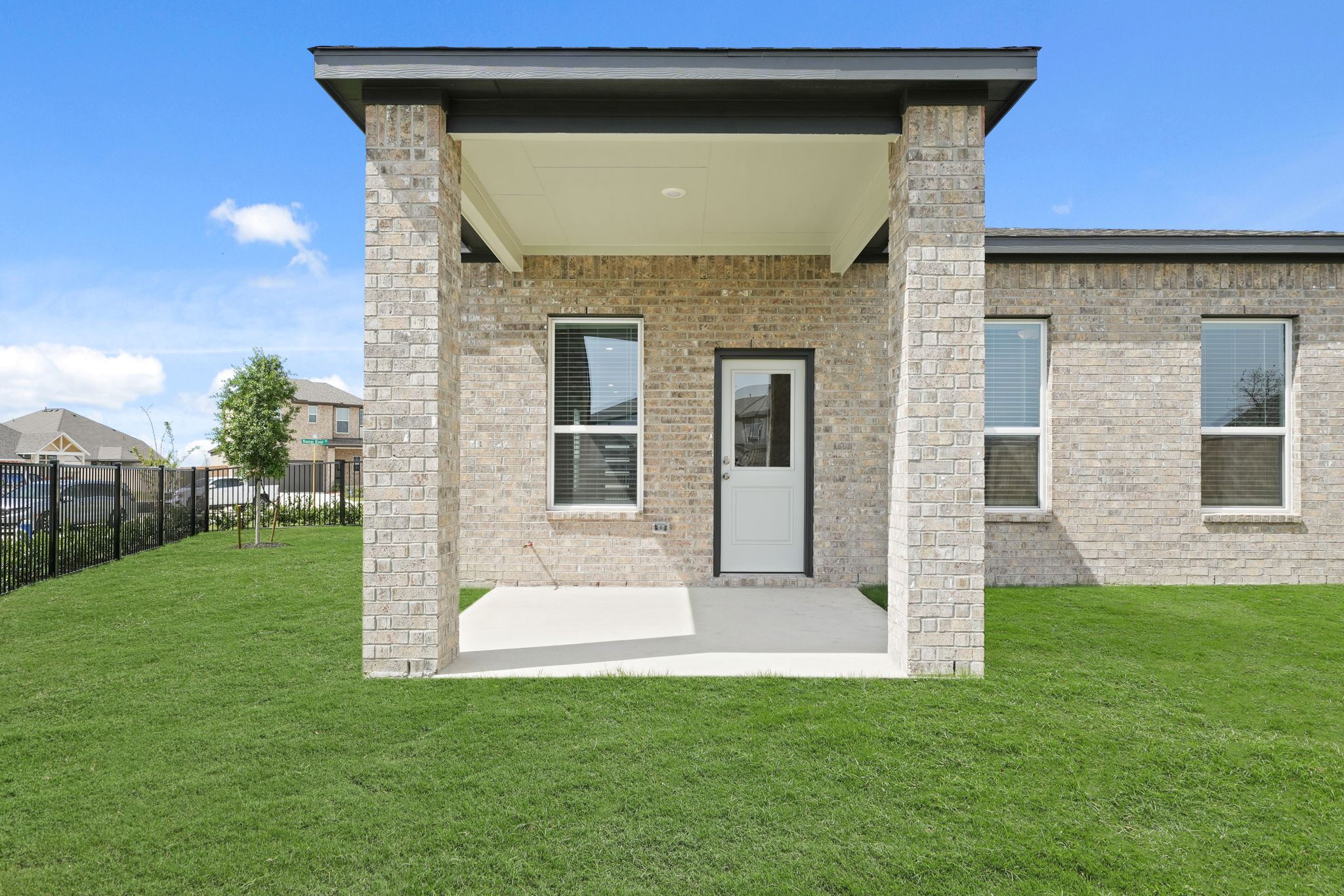 A stone building with a door.