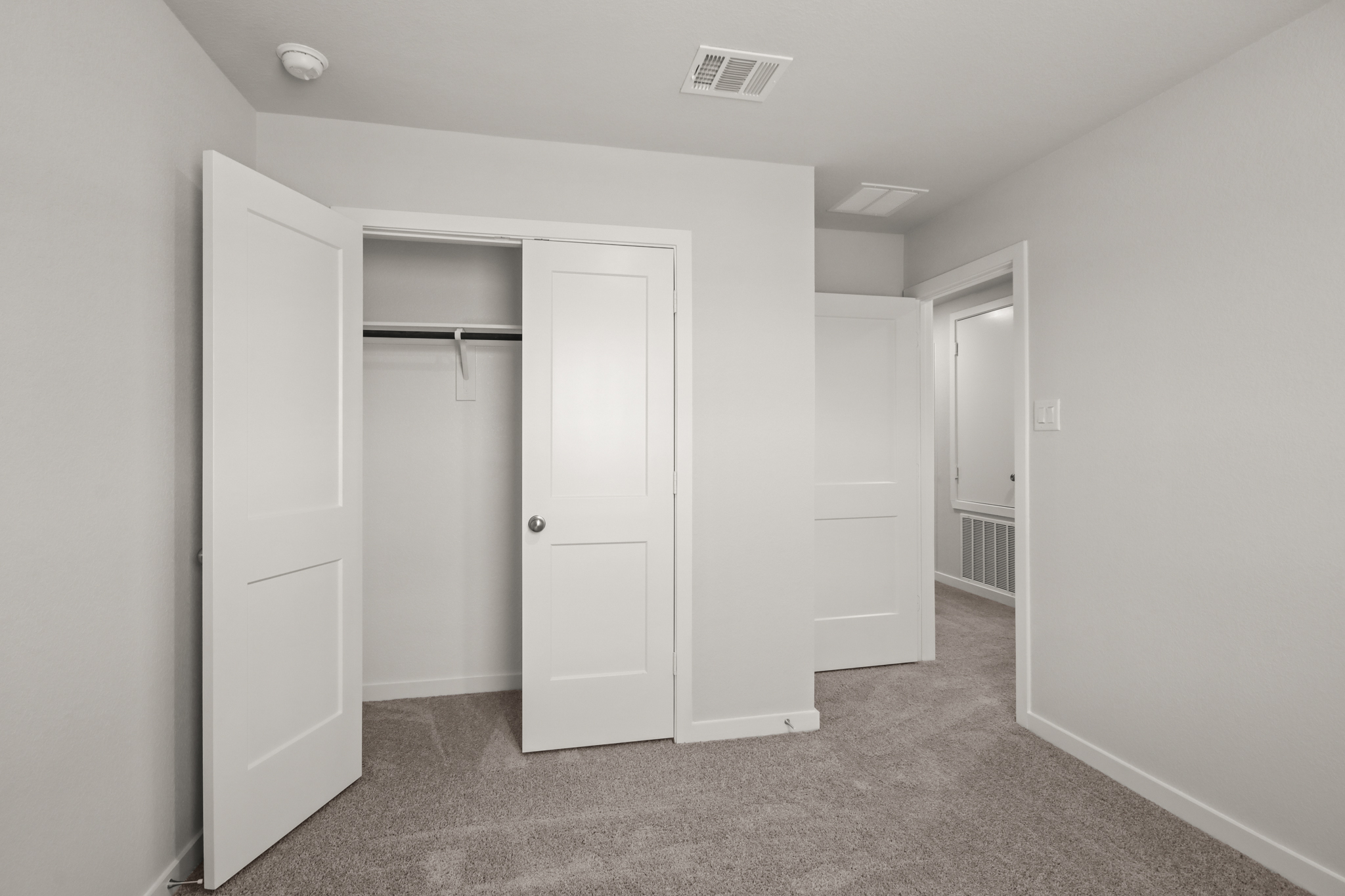 A room with white doors.