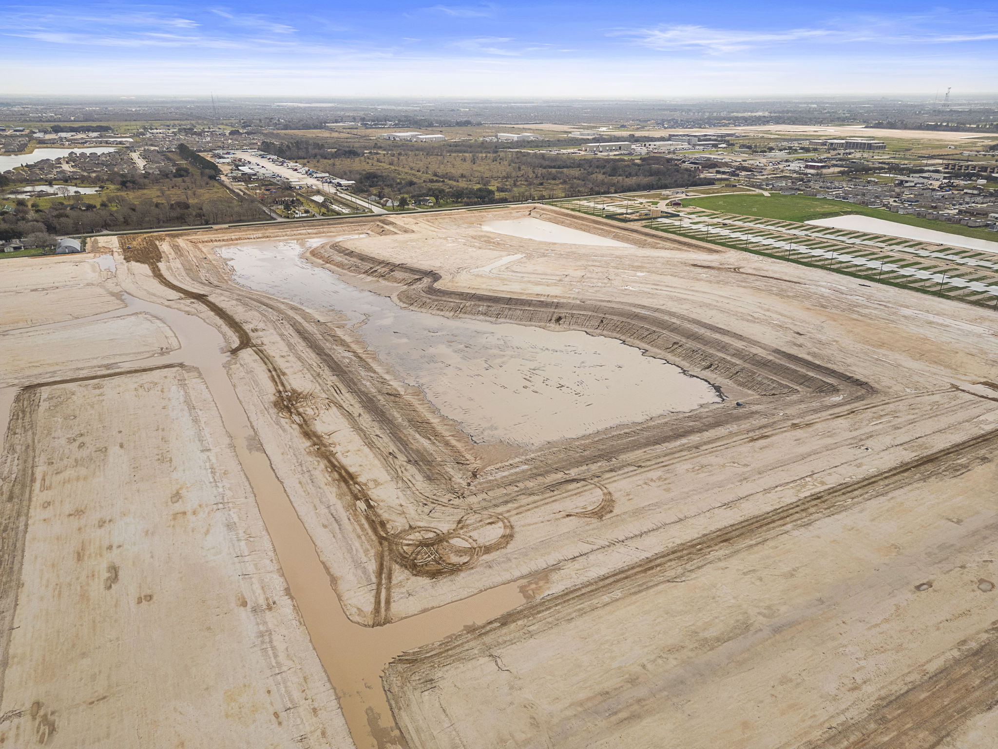 A large area of land with a river running through it.