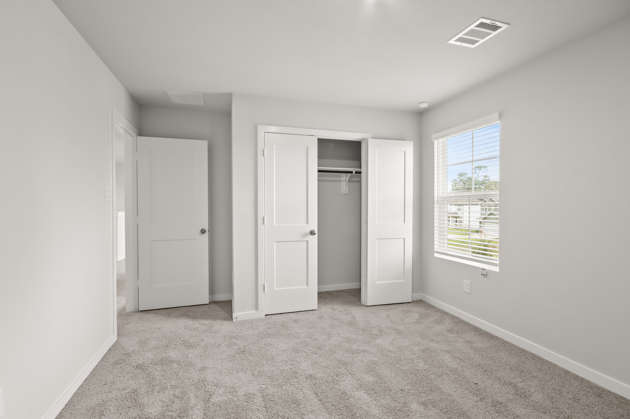 A room with white doors.
