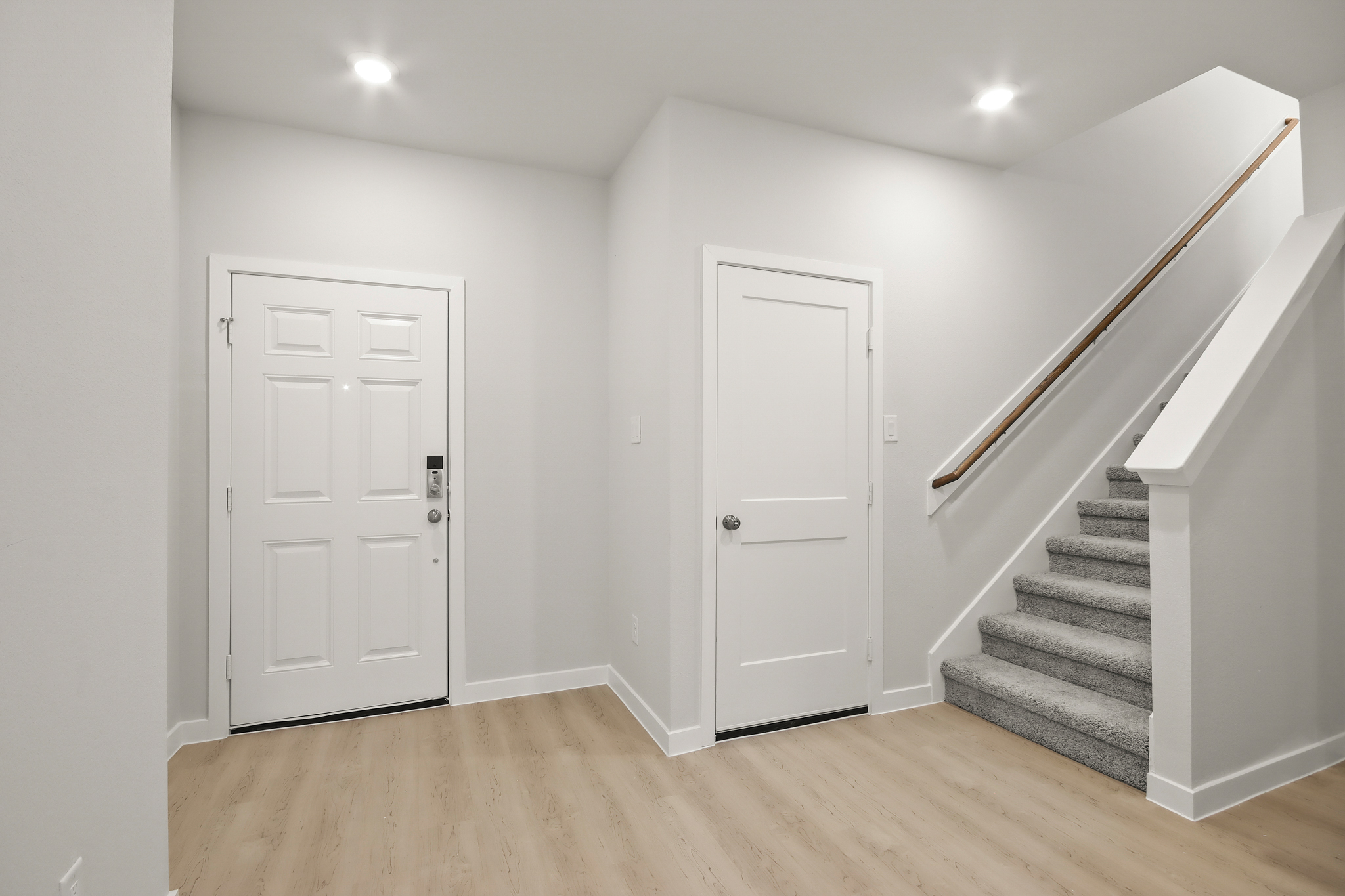 A staircase leading to a door.