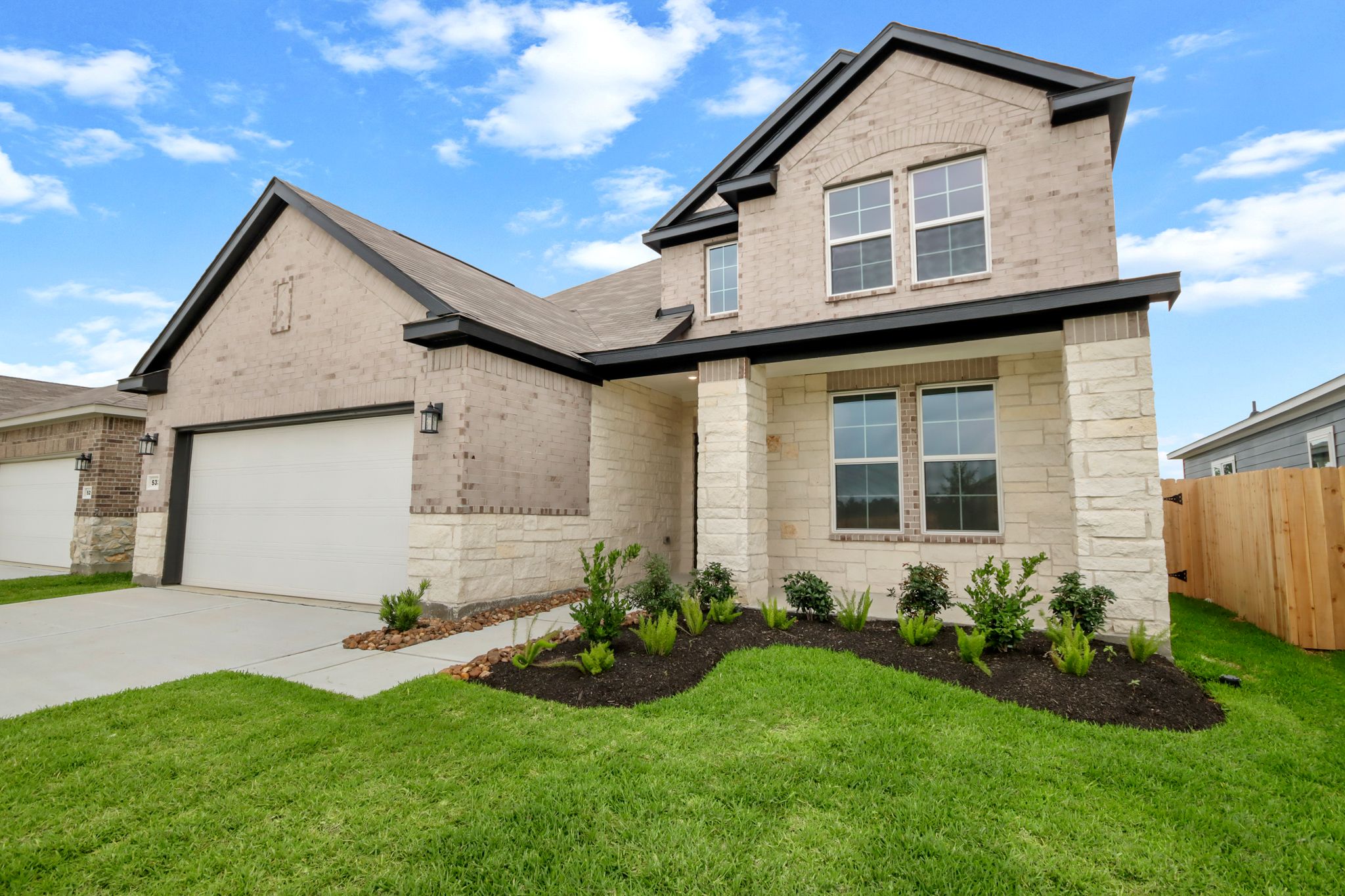 A house with a large front yard.