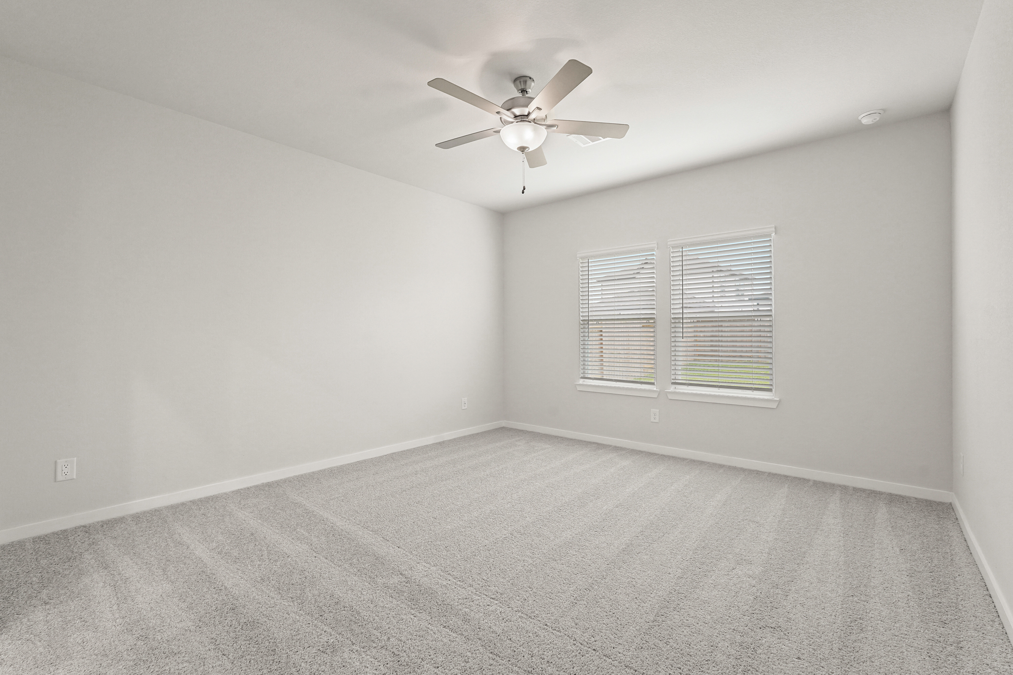 A ceiling fan in a room.
