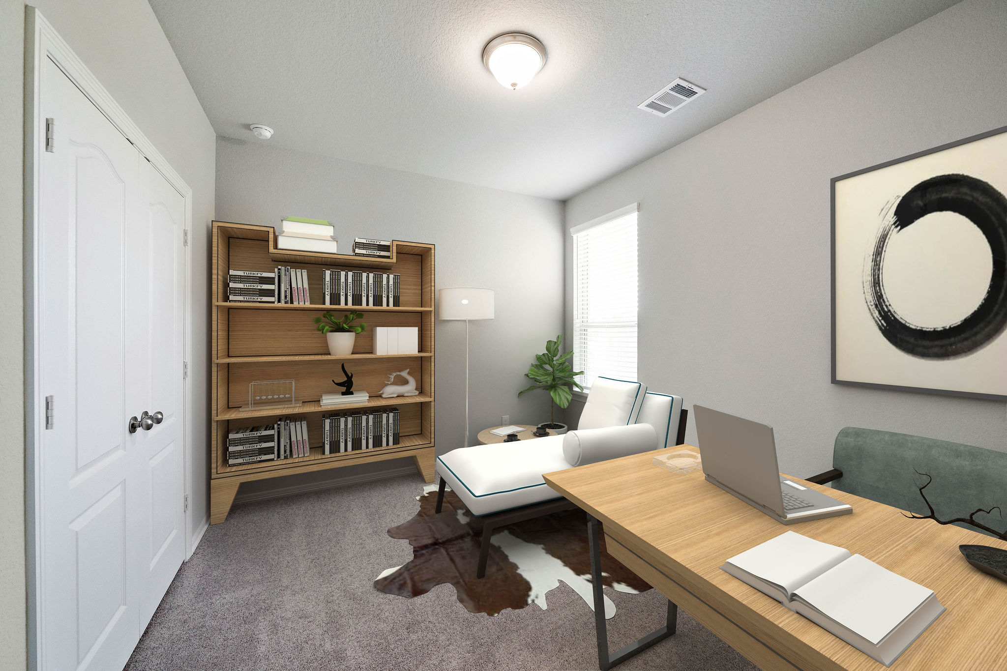 A living room with a laptop.