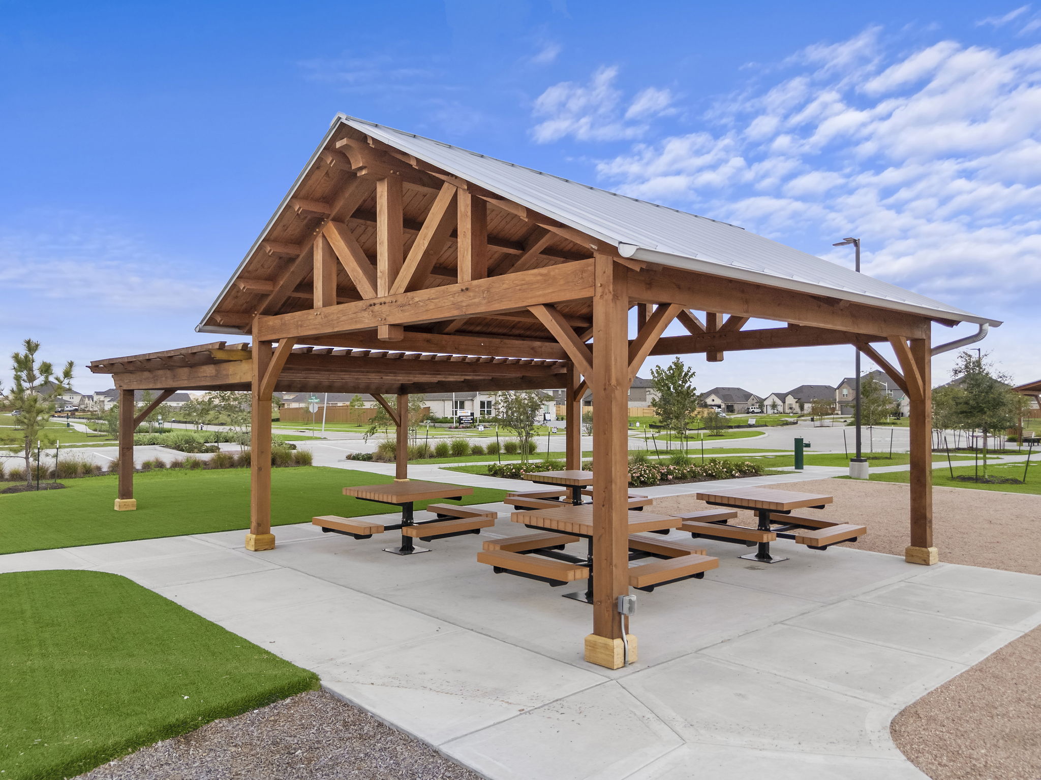 A gazebo with a picnic table.