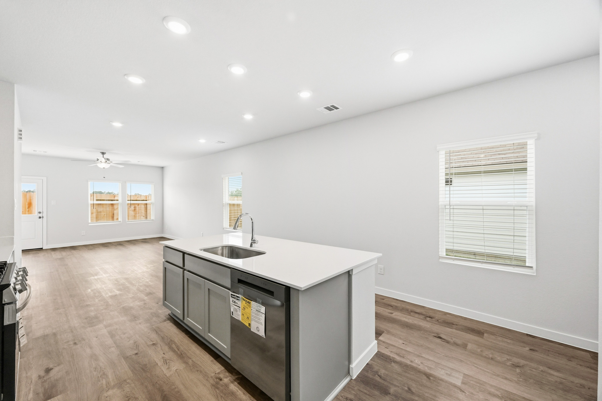 A kitchen with a sink and cabinets.