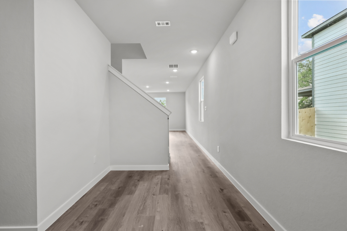 A hallway with windows.