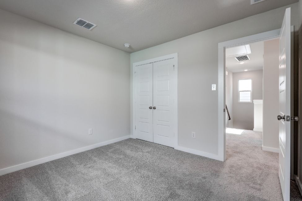 A room with white doors.