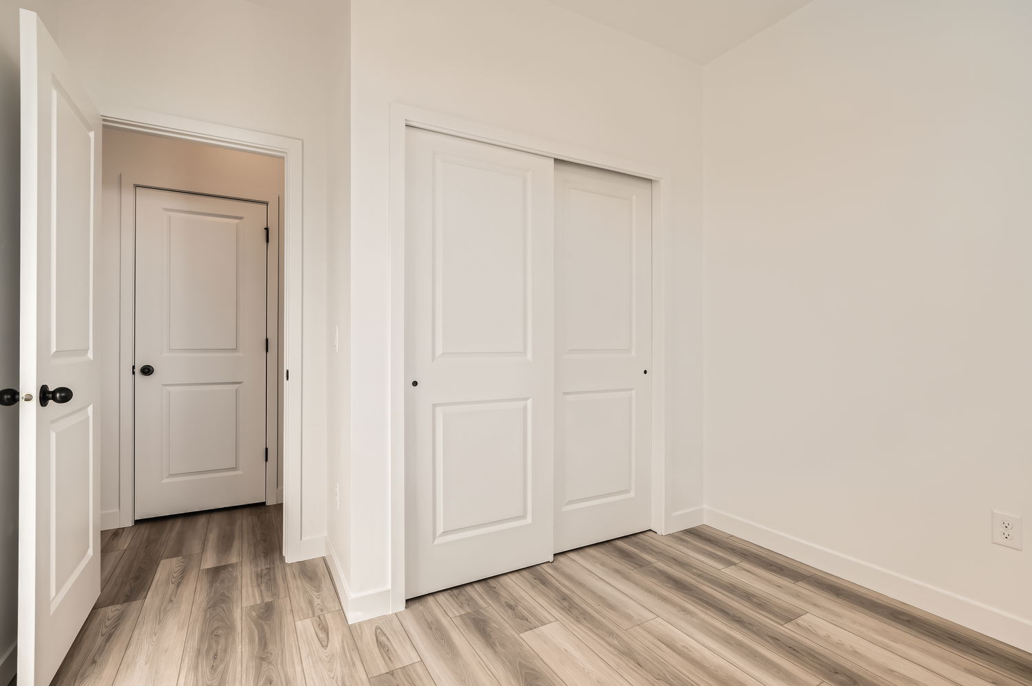 A room with white doors.