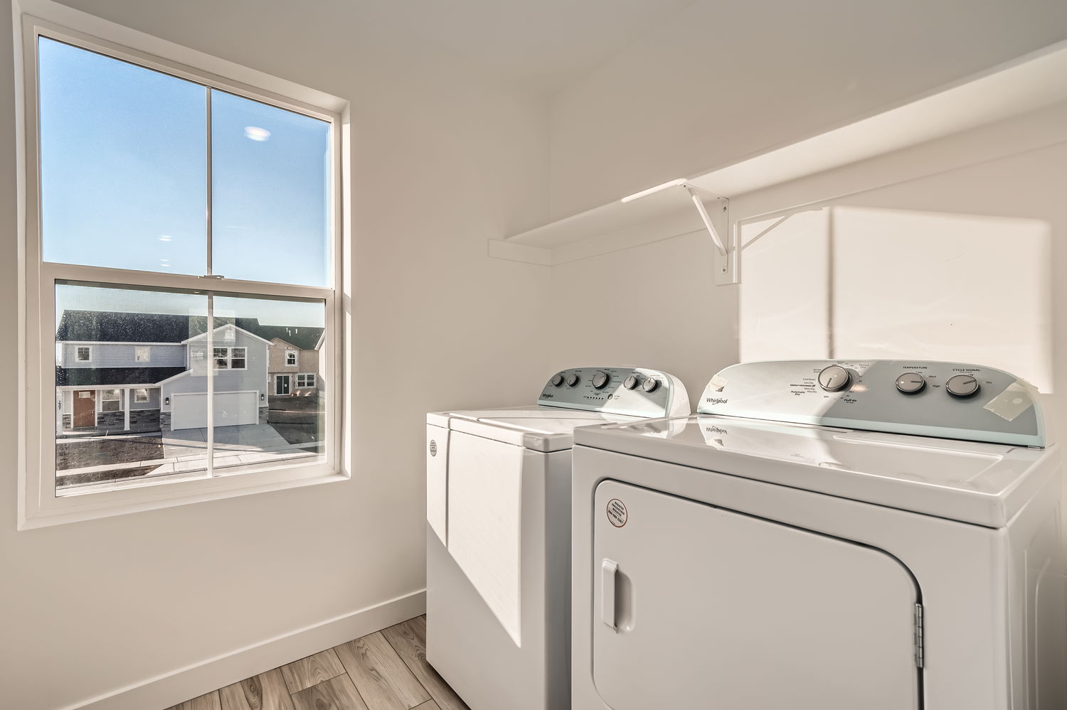 A kitchen with a window.