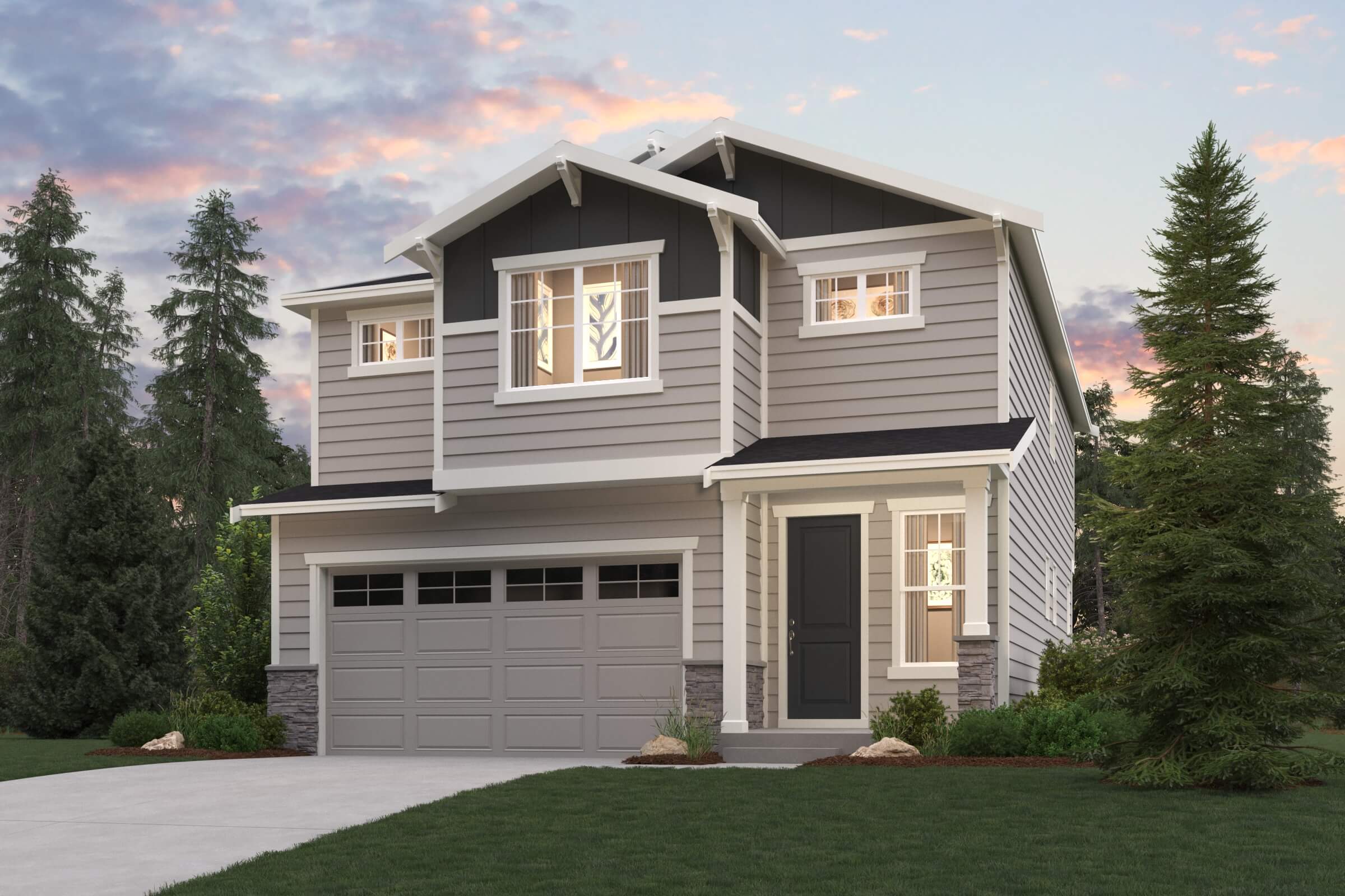 A house with a garage and trees around it.
