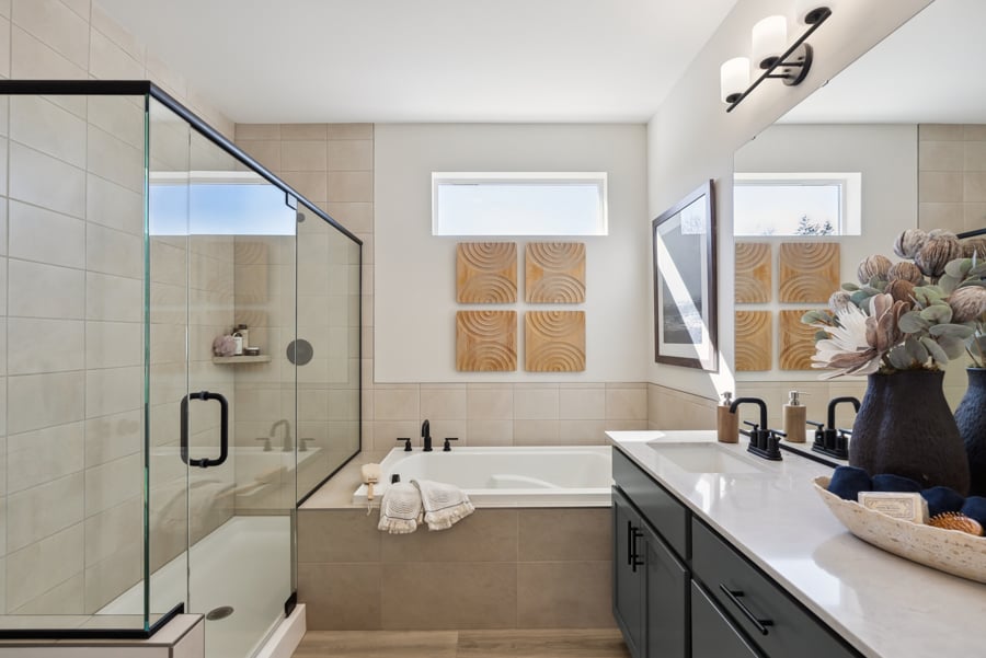 A bathroom with a glass shower.