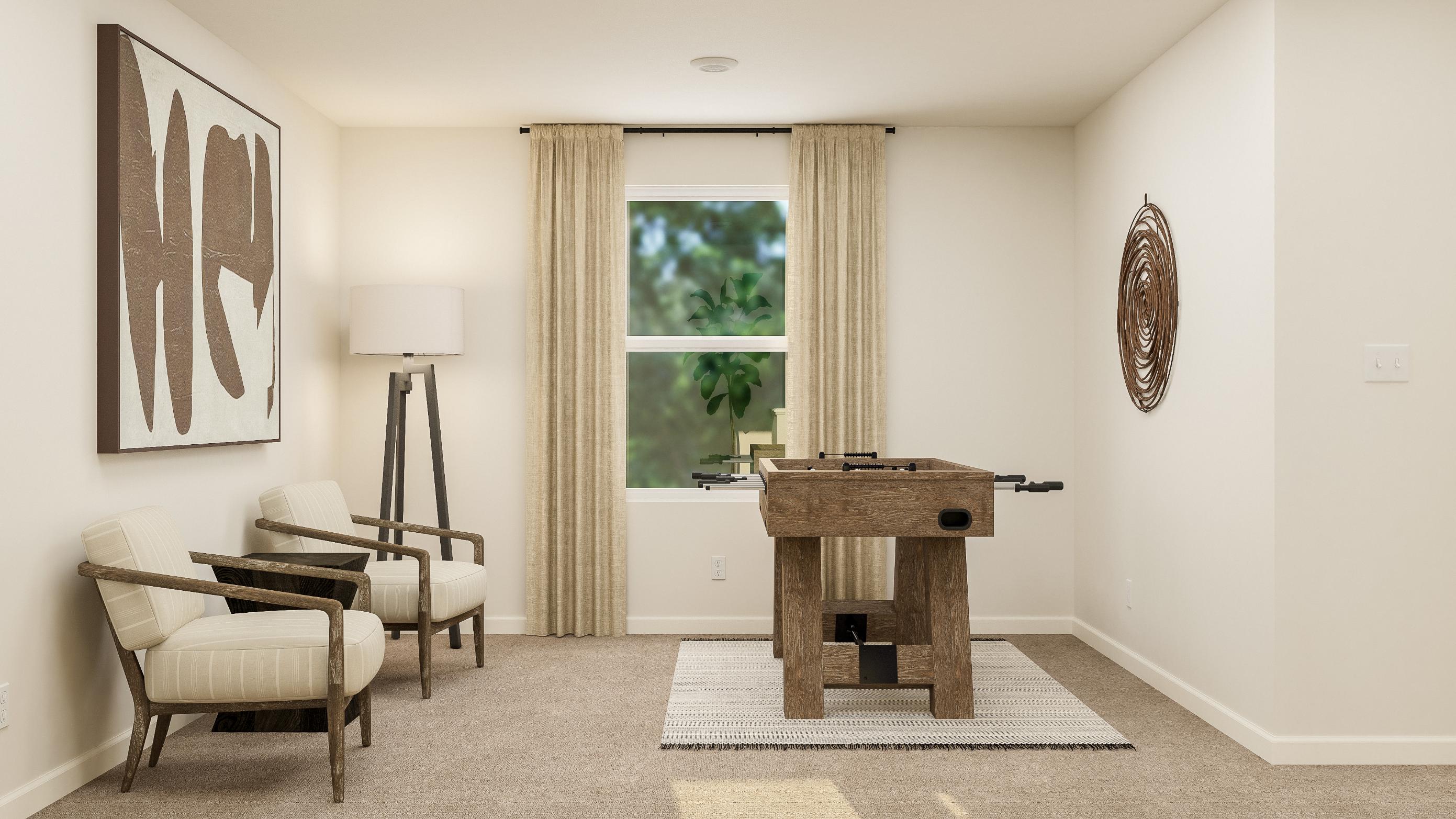 A room with a table and chairs.